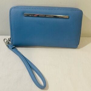 Steve Madden Bzippy zip-around wallet wristlet in a blue color,  "Haze Blue".